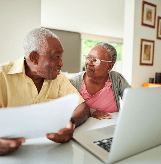 Mature couple using computer